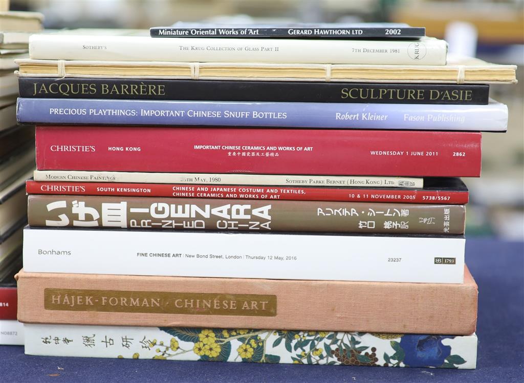 A box of Asian Art books and catalogues and krug glass volumes